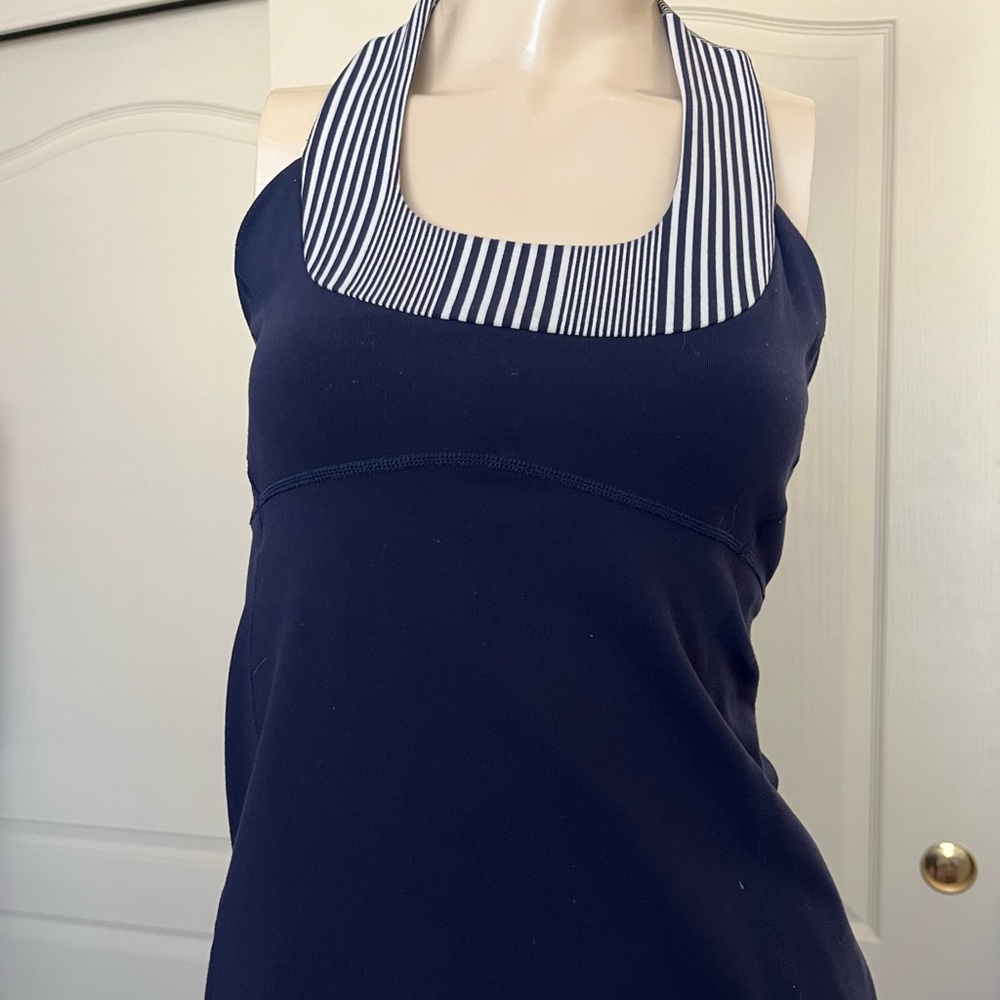 Lululemon tank. Navy blue and whit. Like new. Thicker fabric. Size 8.